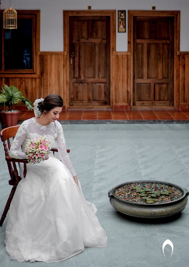 Signature Christian bridal  A-line gown in organza carried by bride Alen