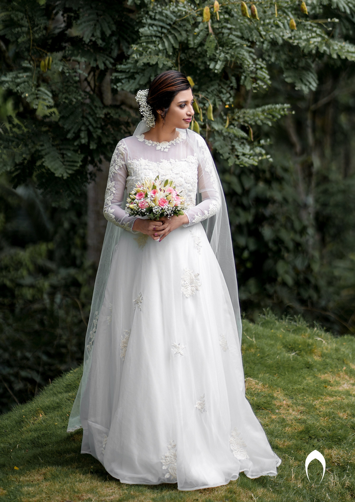 Signature Christian bridal  A-line gown in organza carried by bride Alen