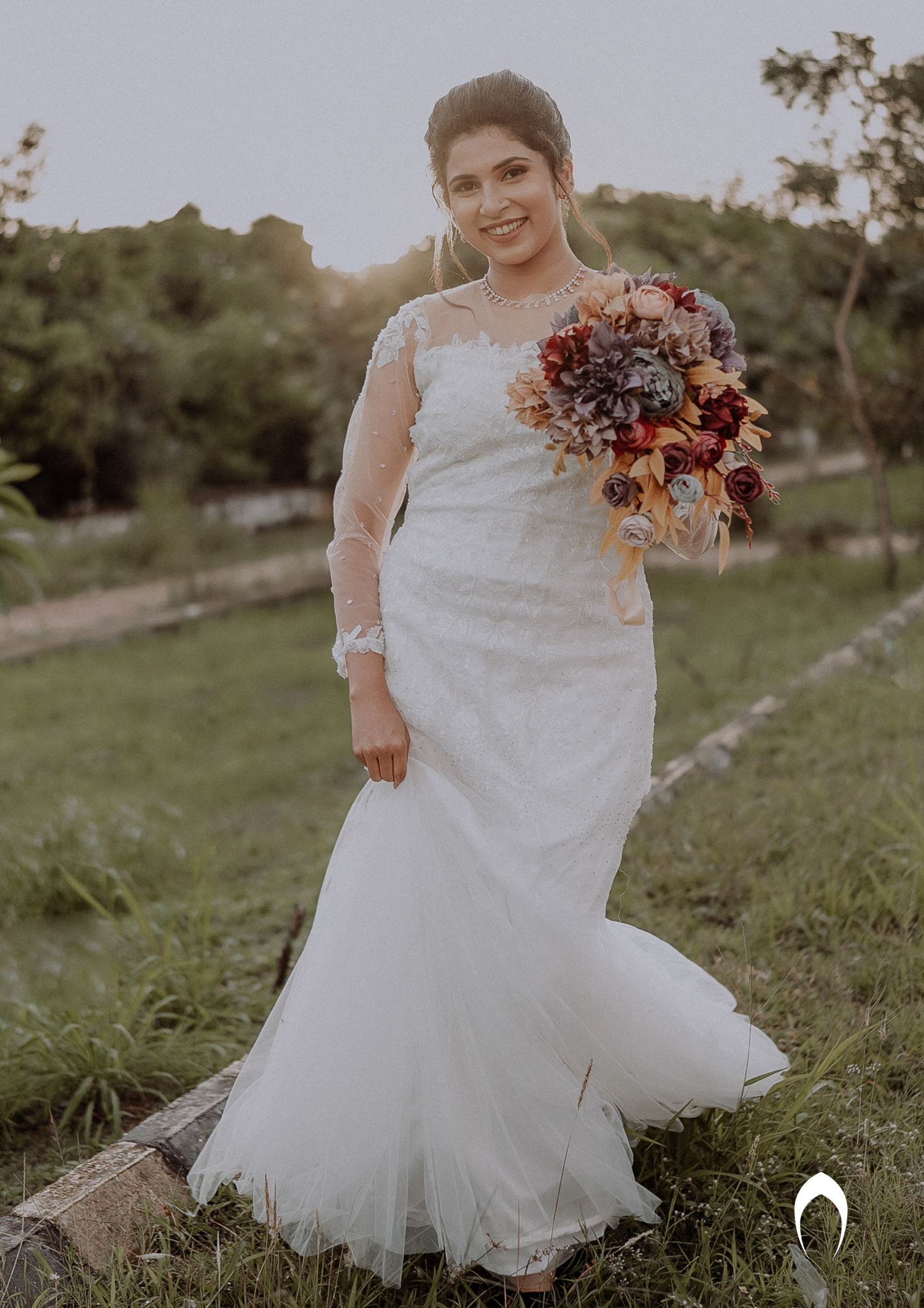 Signature Christian bridal  Mermaid gown in net with beautiful embellished lace work