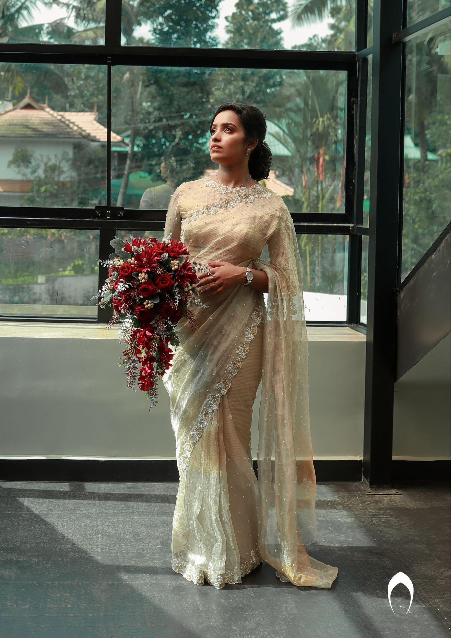 signature Christian bridal saree in tissue fabric with  floral hand embroidery