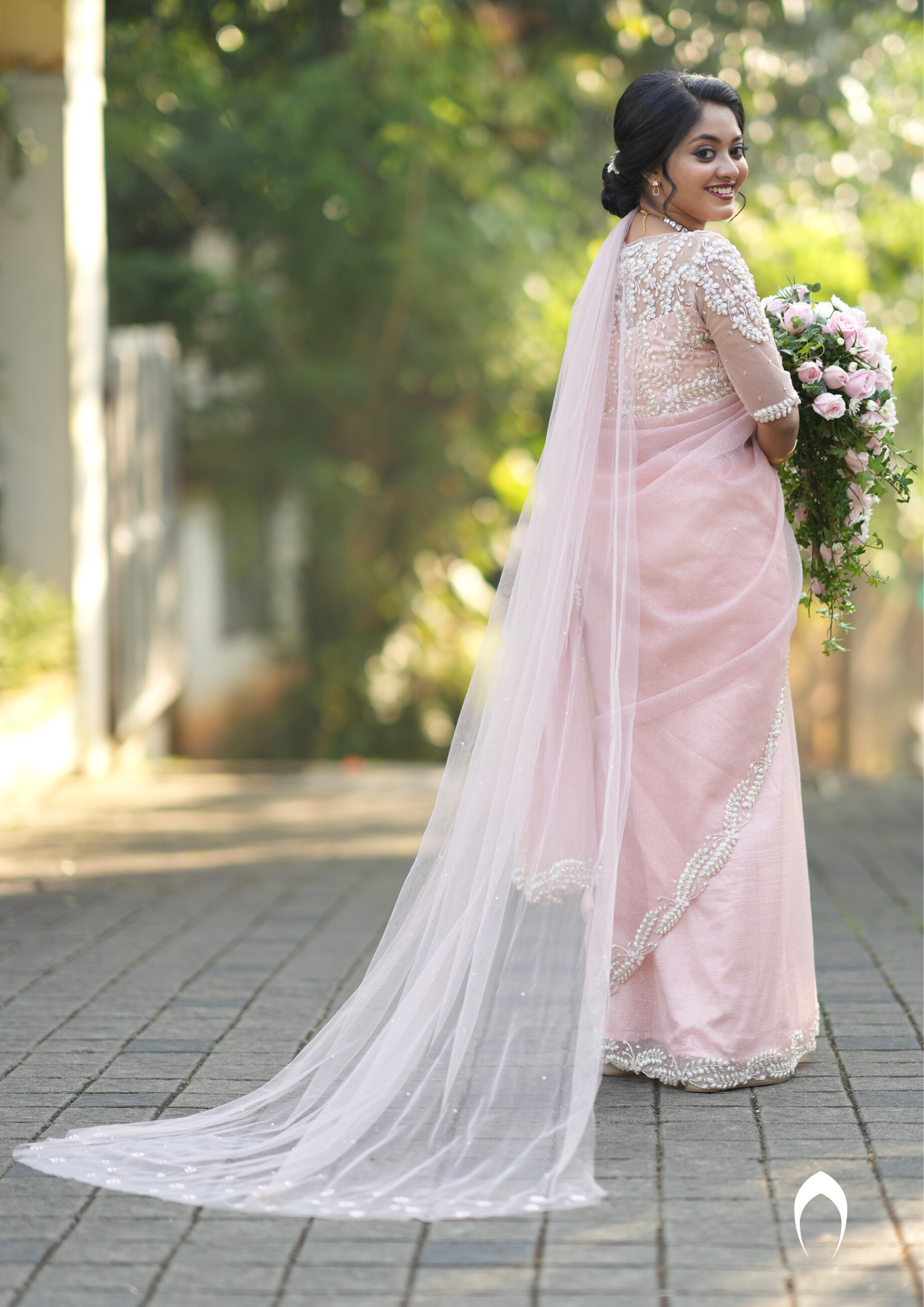 signature Christian bridal hand embellished blush saree in net