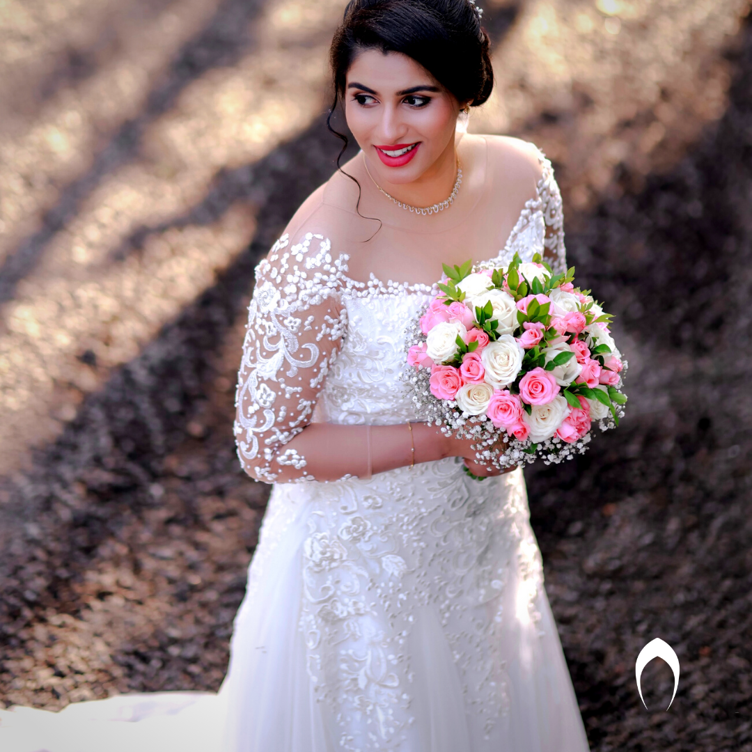 Signature Christian bridal Aline Full Fliar Net gown carried By Bride Mishel