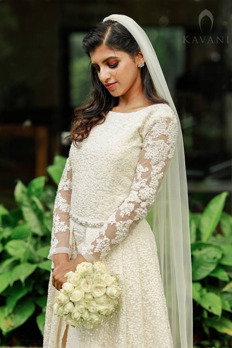 signature christian bridal gown with emperical cut and thread work