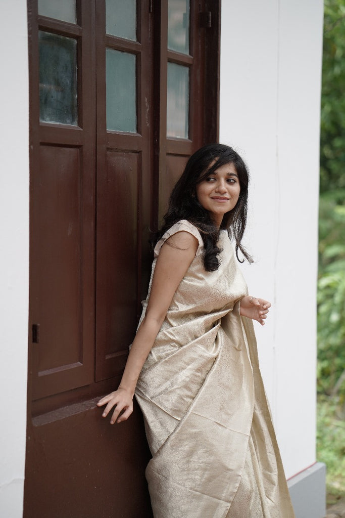 Signature bridal banarasi saree in cream tone with jeri work