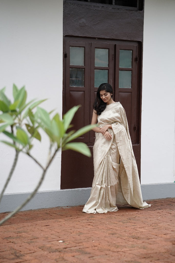 Signature bridal banarasi saree in cream tone with jeri work