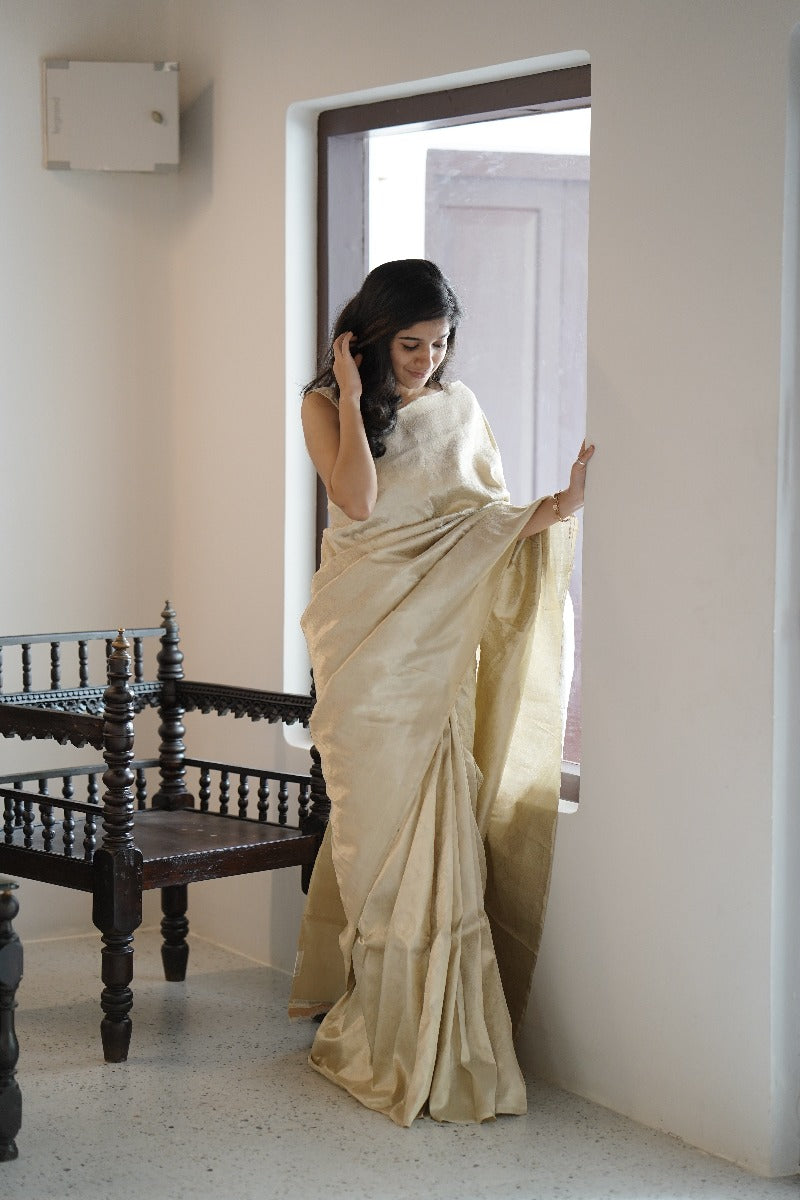 Signature bridal banarasi saree in cream tone with jeri work