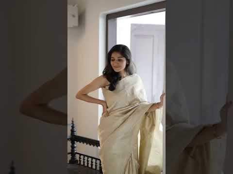 Signature bridal banarasi saree in cream tone with jeri work