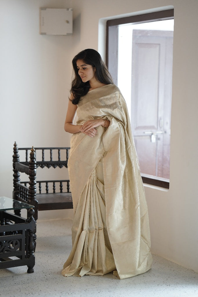 Signature bridal banarasi saree in cream tone with jeri work