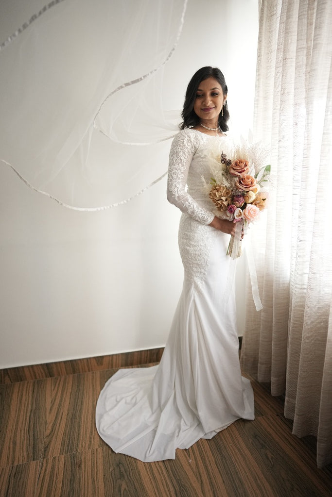 Signature Christian bridal Mermaid Sheath Gown In Matt Spandex Carried By Bride Anju