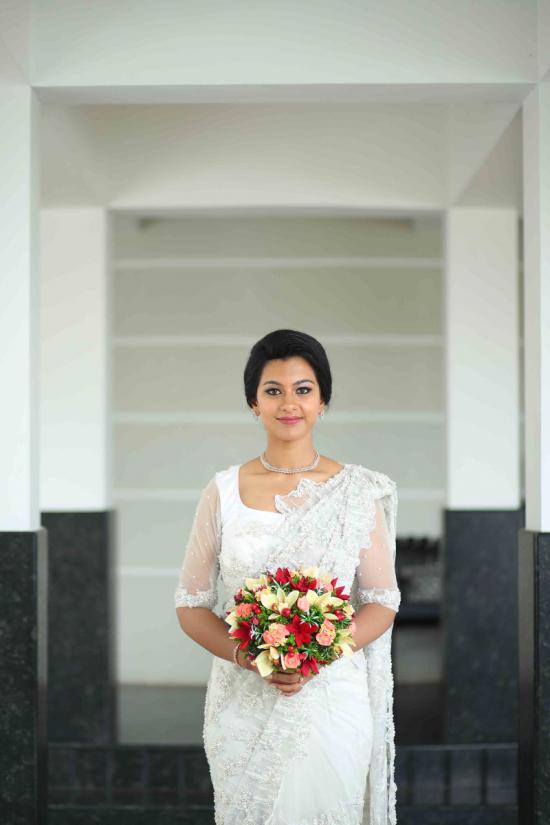 Signature Christian Bridal Saree carried by Bride Irene On Her Wedding
